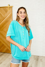 In the Rotation Exposed Seam Tee in Aqua