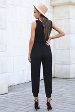 Tied Surplice Neck Sleeveless Jumpsuit (PLEASE ALLOW 5-14 DAYS FOR PROCESSING AND SHIPPING)