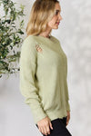 Distressed Round Neck Long Sleeve Sweater