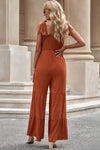 Tie-Shoulder Smocked Tiered Jumpsuit (PLEASE ALLOW 5-14 DAYS FOR PROCESSING AND SHIPPING)